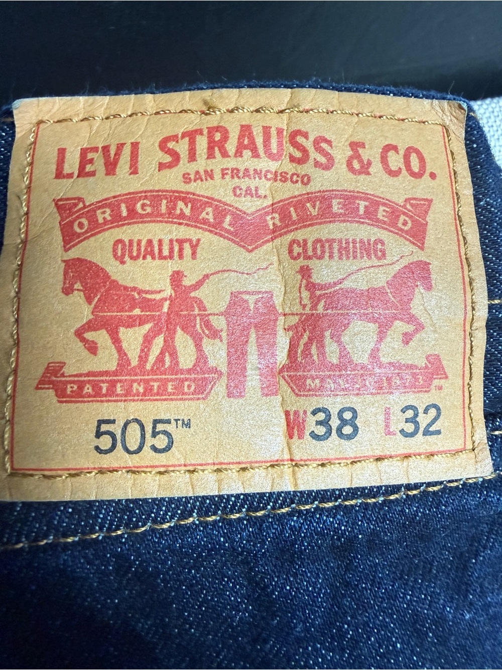 Levi's 505 Straight Fit Jeans in Dark Blue with Tan Patch